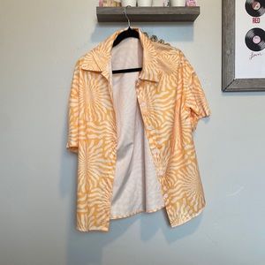 Orange and white short sleeved button up.